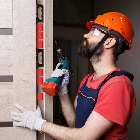 Professional Grade 200 Count Quarter Inch Thick Red Plastic Shims For No Sweat Tile Leveling And Reliable Door Window Gap Filling Designed To Keep Your Home Projects Looking Clean And Dead Nuts Straight Daily used by a man with a drill.