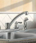 Two-Handle Chrome Kitchen Faucet With Duralock Quick Connect over double sink with side spray hose, mirror-like finish visible