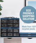 Stacked Foldable 45L Collapsible Utility Crate Heavy Duty Plastic Storage Box With 66 lb Capacity in Obsidian next to a plant.
