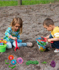 Children playing with Flower Garden Building Kit For Kids 120 Piece Bouquet Toy Set Build A Floral Arrangement STEM Learning