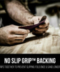 Man holding Pro Grade Precision Faster Sanding Sheets 120 Grit Medium For Wet Or Dry Sanding with No Slip Grip backing on wood