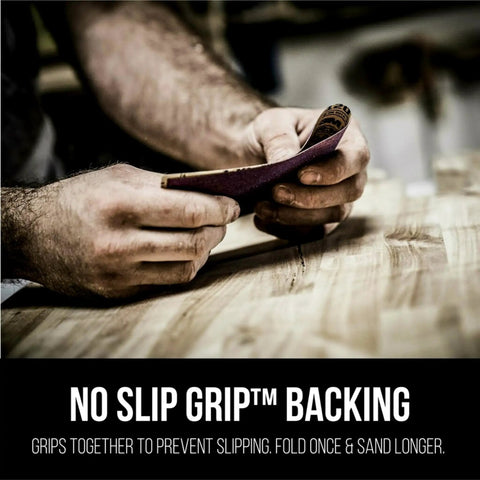 Person using Pro Grade 9x11 Purple Sandpaper Set Of 20 120 Grit Clog Resistant Abrasive on wood surface