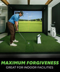 Man practicing on 4x9 Golf Mat With 2 3/8 Inch Thick Construction, Game Ready Feel, Dual Stance Hitting Strip in indoor simulator