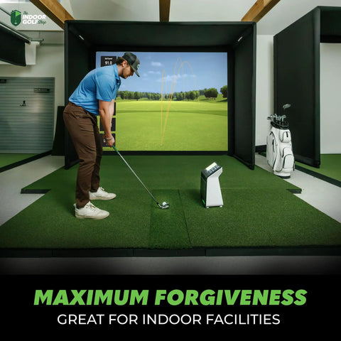 Man practicing on 4x9 Golf Mat With 2 3/8 Inch Thick Construction, Game Ready Feel, Dual Stance Hitting Strip in indoor simulator