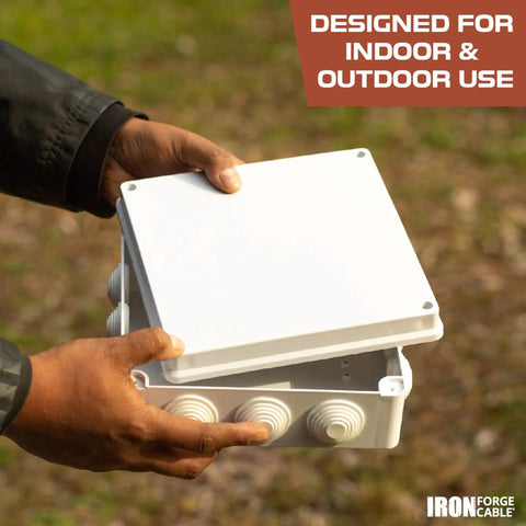 Person holding Outdoor Electrical Box 8x8x3.2 Inches White Waterproof IP65 ABS Plastic Drillable Cover With Complete Accessories
