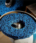 Close-up of 125mm Poly Strip Abrasive Disc Wheel for angle grinder, designed for removing rust and grime efficiently.