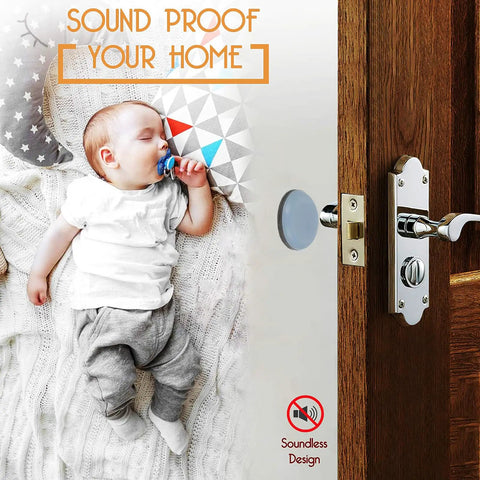 Baby sleeping soundly on a blanket with a door handle and soundproofing pad, promoting a quiet home environment.
