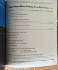 Open Water Diver Course knowledge review page in guide "How To Use And Choose Dive Computers For Scuba Gear Junkies Real World Guide To Picking The Right Console Or Wrist Computer, Understanding Algorithms, Air Integration, Battery Life, And Safety Essentials."