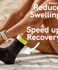 Person wearing Ankle Support Compression Sleeve For Running, Soccer And Volleyball - Medium, Black Pair on marble surface