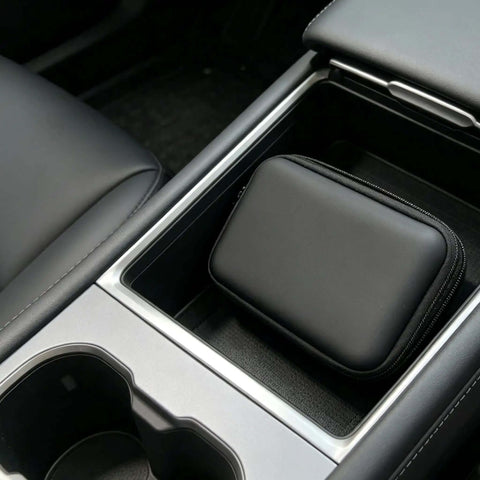 Hassle Free Waterproof Cable Organizer Pouch With Plush Velvet Interior in car cup holder, compact storage for chargers and cables.