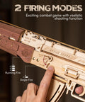 Close-up of Wooden 3D AK47 Puzzle Model with rubber band shooter showing two fire modes and realistic magazine load