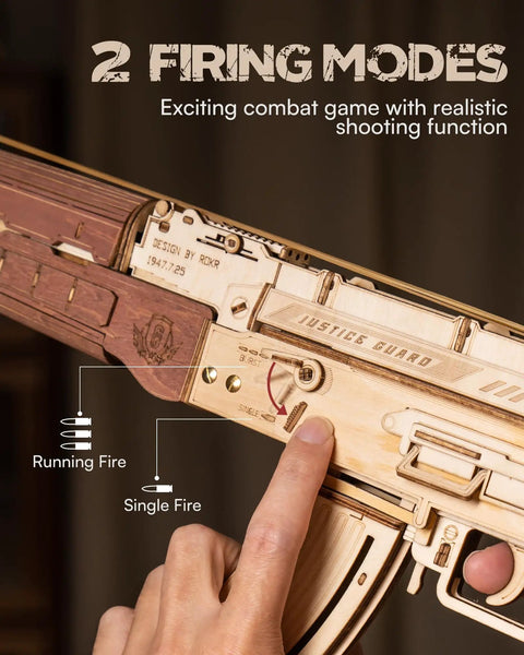 Close-up of Wooden 3D AK47 Puzzle Model with rubber band shooter showing two fire modes and realistic magazine load