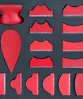 No Fuss Hand Sanding Block Set Of 16 With Hella Durable Foam Pads, variety of red shaped pads for precision sanding tasks.