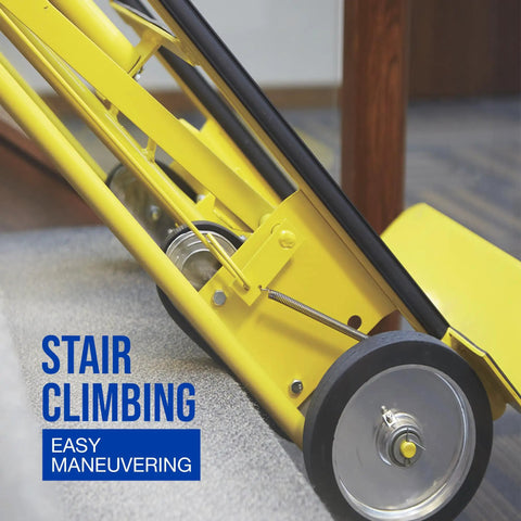 Close-up of a yellow heavy duty hand truck 1200 pound capacity appliance dolly showing wheel mechanism for stair climbing.
