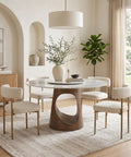 Built Tough 47 Inch Round Dining Table With White Sintered Stone Top And Legit Smooth Rotating Lazy Susan For Chowing Down With Two To Six Guests Hangout Style in a modern dining setting.