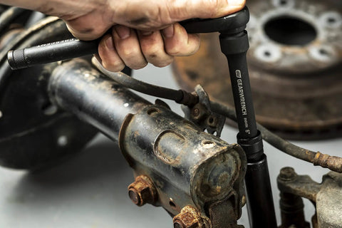 Locking 1/2 Inch Drive Impact Extension Set With 3 Inch, 6 Inch And 12 Inch Extensions, Detent Pin Retention in use on auto part