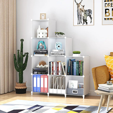 9 Cube White Storage Organizer Set, Modular Cube Shelves with books, decor, cactus, and accents in living room setting.