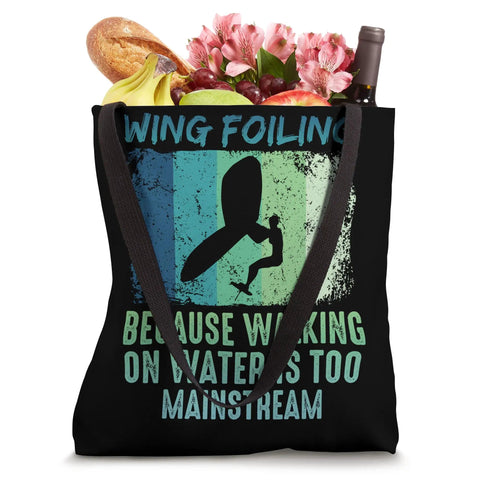 Retro Wing Foil Tote Bag for Wingsurfing Fans with Vintage Man on a Wingboard Design, holding groceries and flowers.