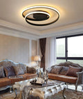 Sleek Modern Black Spiral Ceiling Light Round Flush Mount LED Fixture With Remote Control, installed in a living room.
