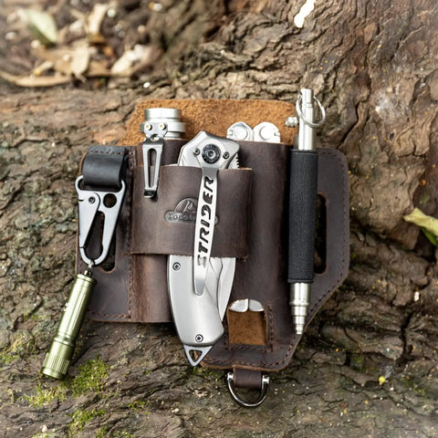 Leather EDC Multitool Sheath Belt Organizer for Daily Carry and Work Use with tools on tree bark