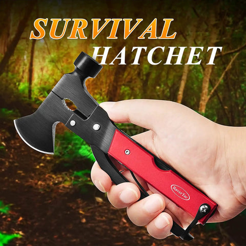 Hand holding 14-In-1 Multitool Camping Axe Hatchet with knife, hammer, saw, pliers, red handle, against forest background
