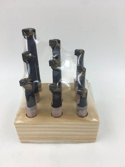 Quick Change Tool Post Holder Set Pro Grade With Nine Pieces Three Eighths Inch Boring Bar And Five Indexable Carbide Inserts Turning Tool Bits Kit For 7x10 7x12 And 7x14 Mini Lathes displayed on wooden stand