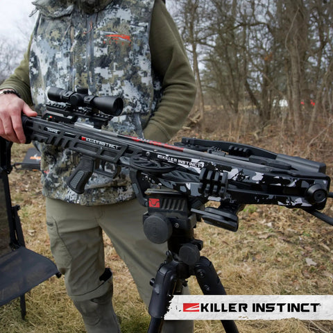 Person holding Beast Mode Crossbow Kit With 405 FPS Power And 195 Lb Draw Weight X Cam System outdoors on tripod