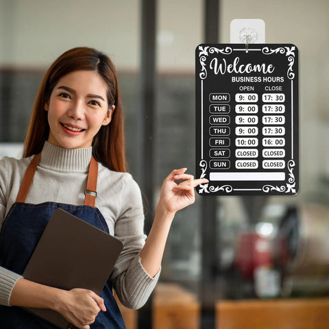 Woman holding business hours sign, Two Pack Changeable Business Hours Signs For Doors And Windows With Six Time Stickers In Durable Black PVC Measuring 13.78 By 9.45 Inches Perfect For Coffee Shops Bars Cafes Restaurants Front Entrance Or Window Displays