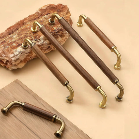 4 Pack 3.8 Inch Gold Walnut Wood Brass Drawer Pull Handles For Dresser Cabinet Wardrobe displayed on wood surface