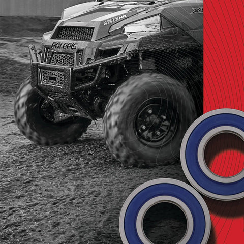 Closeup of Wheel Bearing Seal Kit 25-1092 with ABEC 3 bearings for Yamaha Dirt Bikes and mud-covered off-road vehicle in background.