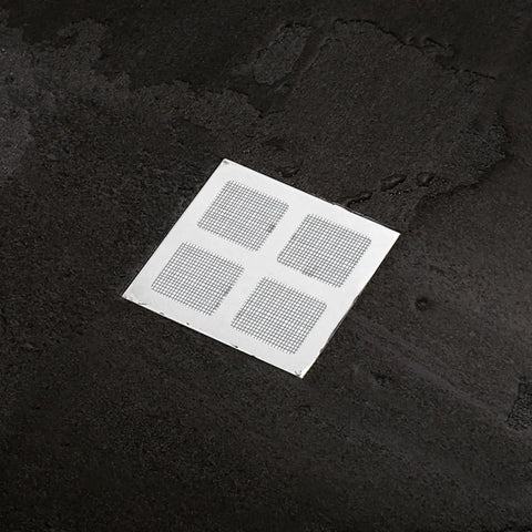 Lcarege Disposable Hair Drain Stickers, 60 Pack 4x4 Fiberglass Disposable Drain Covers on a dark surface.