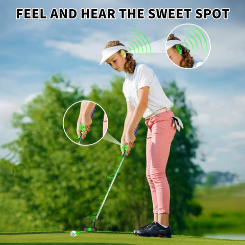 Junior Edition Kids Putter 24 Inch Right Handed With Soft Grip And Alignment Line Black Orange For Ages 3 To 8 Height 3 Feet 2 Inches To 4 Feet Perfect Starter Putter For Young Golfers held by young player on green.