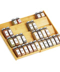 No Sweat Adjustable Bamboo Spice Drawer Organizer Expands To Fit Any Kitchen Cabinet Slot holding spice jars in a smooth, tiered layout.