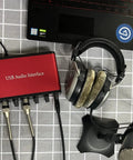 2x2 USB Audio Interface With 48V Phantom Power and 24-bit 96kHz Recording for Microphones and Instruments with headphones