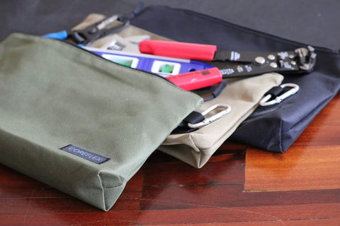 Heavy Duty Tool Pouch Set Large 12 Inch Zipper Bags With Flat Bottom YKK Zippers 3 Pack on wooden surface