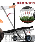 Tow Behind Dethatcher Powerful 40 Inch With 20 Spring Steel Tines Lift Handle For ATV And Mover Tractors Lawn Rake shown in use