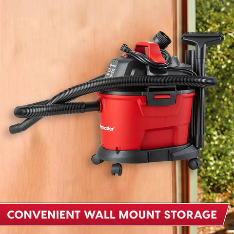 Compact 3.2 Gallon Wet Dry Shop Vacuum With 2.5 Peak HP Wall Mounted Design in garage showing tool storage bracket