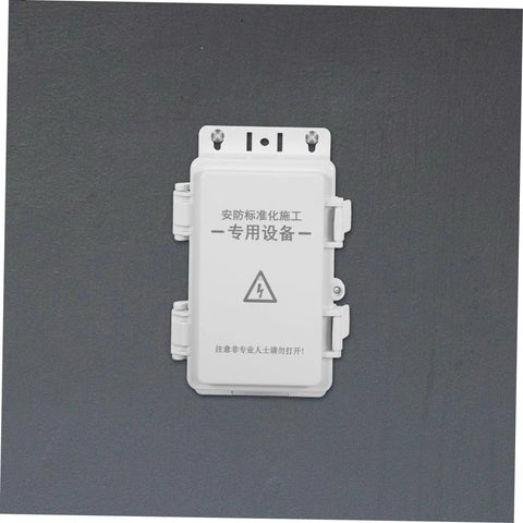Heavy Duty Outdoor Electrical Enclosure Plastic Junction Box Waterproof For Surveillance Cameras And Electronic Components Systems Built To Last Through Rough Weather With Super Easy Install, white plastic box mounted on gray wall.