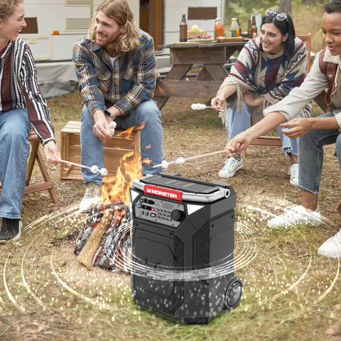 Crank Up Party Ready 360 Degree Bluetooth Speaker With 240W Power beside a campfire, people enjoying music outdoors
