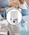 Compact Portable Washing Machine For Travelers And Students Slick Laundry Appliance with digital display and transparent design.