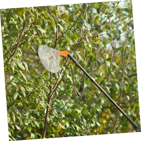 Windproof Spray Nozzles With Adjustable Misting For Garden Sprayer Tanks Transparent Deflector Cover in use on foliage