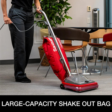 Hardcore Commercial Upright Bagged Vacuum Cleaner With Vibra Groomer Brush Roll, Fifty Foot Power Cord, Six Decked Out Height Settings, Beefy Long Life Motor, And Zero Hassle Shake Out Bags in use on low carpet.