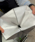 Person holding open Reusable Dust Bag For Festool Midi CT 15 E And CT 25 HEPA Dust Extractors, showing interior texture