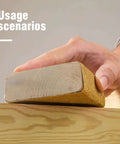 Hand using Longboard Sandpaper 220 Grit Two And Three Quarter Inch Wide By Twenty Yard PSA Roll on wooden surface