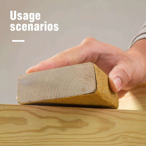 Hand using Longboard Sandpaper 220 Grit Two And Three Quarter Inch Wide By Twenty Yard PSA Roll on wooden surface