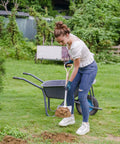 Person using Heavy Duty 41 Inch Stainless Steel Border Spade With D Grip Handle For Garden Digging And Transplanting
