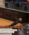 Close-up view of Zenith 2 USB C Audio Interface with 2 headphone outputs on wooden table.