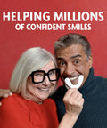 Smiling couple holding All Day Hold Denture Adhesive Seals for Uppers in Fresh Mint, Zinc Free and Mess Free, 30 Count Pack.