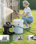Woman using Powerhouse 750W Airless Paint Sprayer Kit on a fence with a paint bucket nearby in a landscaped yard.