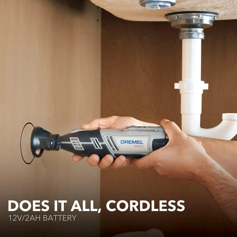 Person using 12V Cordless Rotary Tool Kit With 28 Accessories And Case For Engraving Sanding Polishing Wood Carving And Detail Work Portable Power For DIYers And Pros On The Go under a sink.